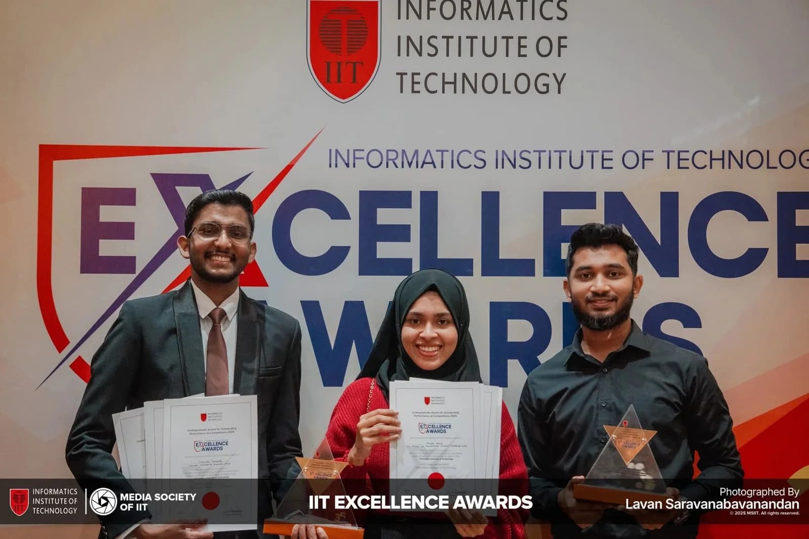 IIT Excellence Awards: attendees posing with certificates at the recognition event